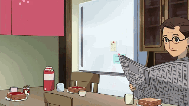 a man is reading a newspaper in front of a refrigerator