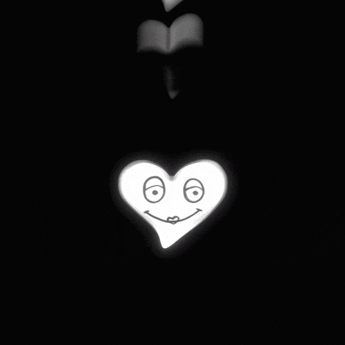 a drawing of a heart with a face on it