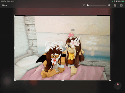 a screenshot of two girls on a bed with the time of 6:15 pm on mon oct 3