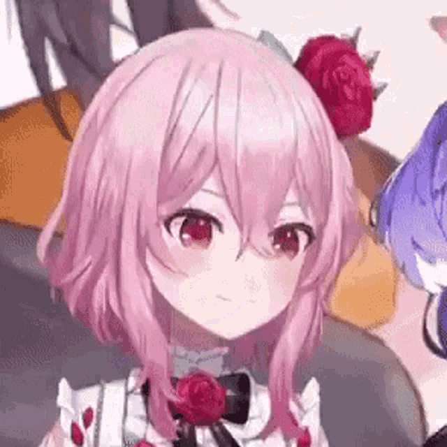a girl with pink hair and a red rose in her hair is standing next to another girl .