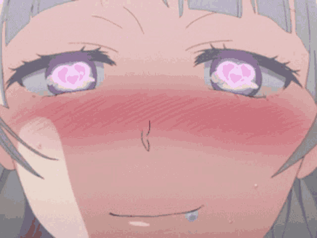 a close up of a girl 's face with a heart shaped eye