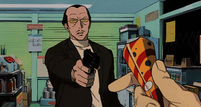 a man in a suit is pointing a gun at someone holding a lollipop in front of a valentine 's day sign