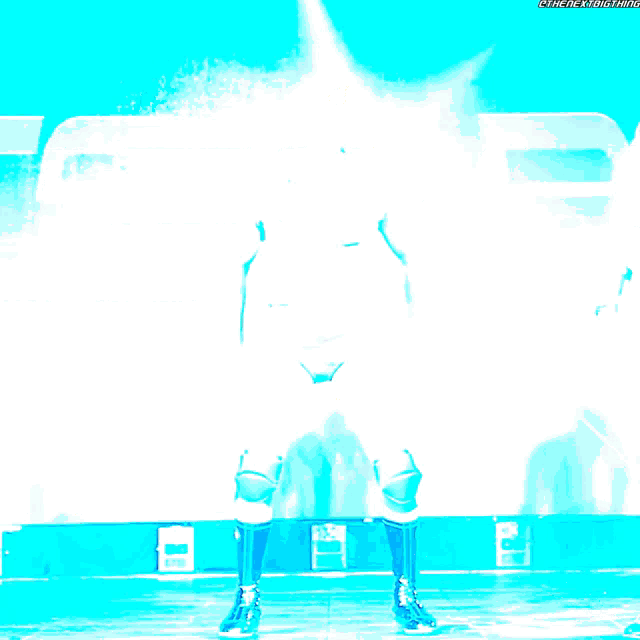 a wrestler in a blue outfit with the word cesaro on his trunks