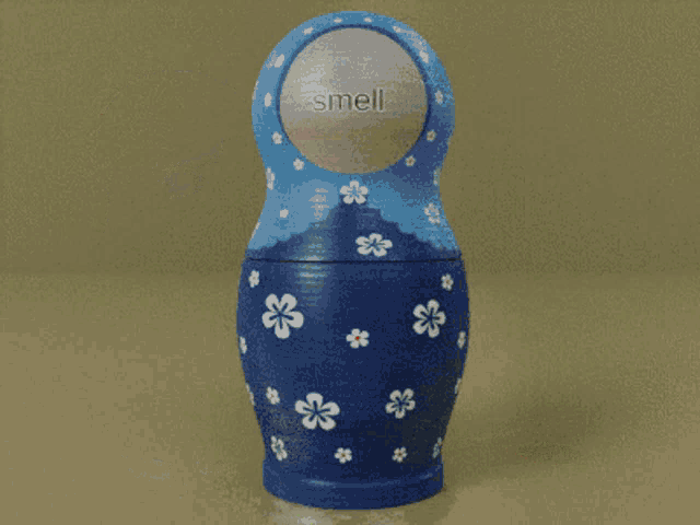 three nesting dolls are lined up in a row with one that says mell on it