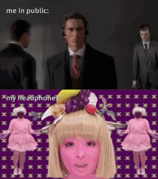 a man in a suit and tie stands next to a woman in a pink dress with headphones on