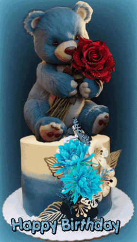 a blue teddy bear is holding a red rose on top of a birthday cake that says happy birthday