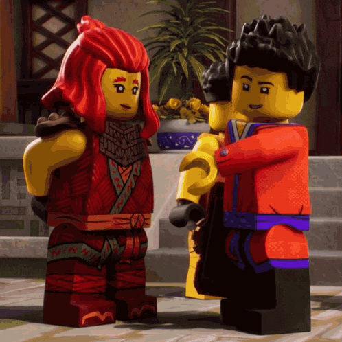 a man and a woman are standing next to each other in a lego scene