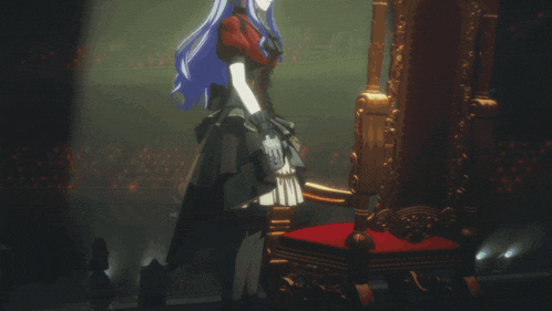 a woman in a black dress stands next to a throne with hearts on it