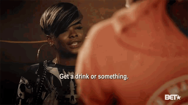 a woman says " get a drink or something " to a man