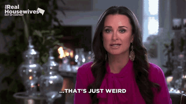 a woman says that 's just weird in front of a sign that says real housewives out of context