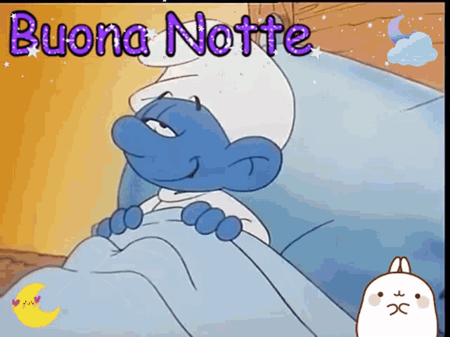 a cartoon smurf is laying in bed with the words buona notte written above him