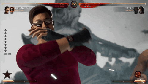 a video game screen with johnny cage and reptile