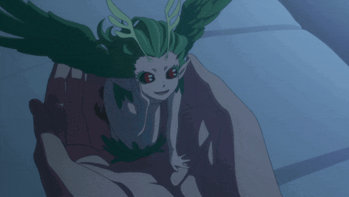a person is holding a green and white anime character with red eyes