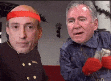 a bald man wearing a red headband stands next to a man holding money