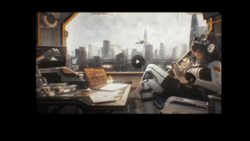 a video of a woman sitting at a desk with a play button