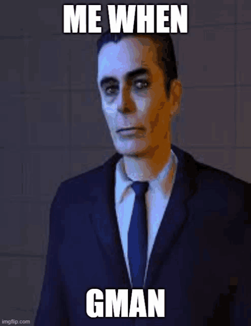 a man in a suit and tie is making a funny face with a caption that says `` me when gman '' .