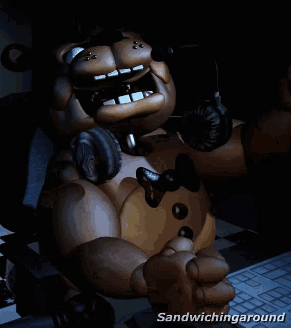 a picture of a teddy bear with headphones and the words sandwiching around