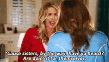 two women are talking to each other and one of them is saying cause sisters , by the way , have ya heard