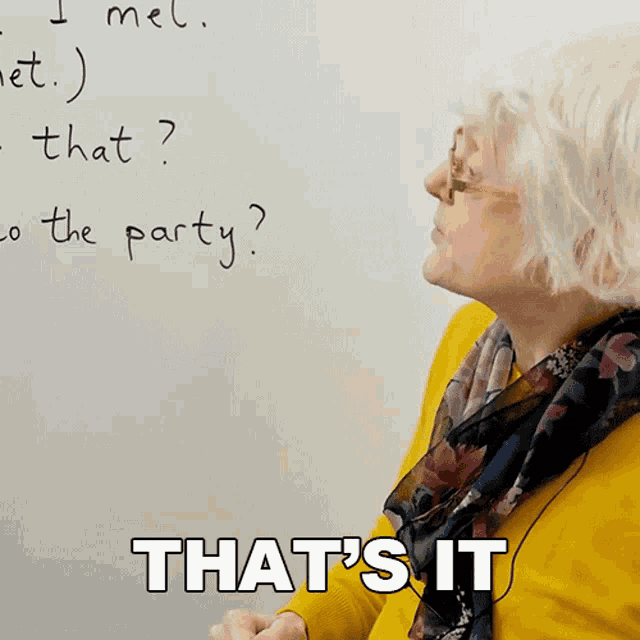 a woman in front of a white board with the words that 's it