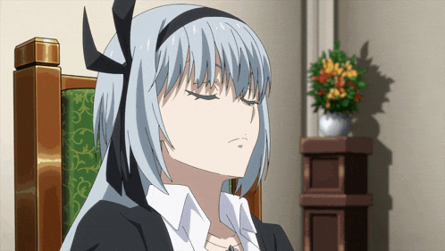 a girl with blue hair and a black headband sits in a chair with her eyes closed