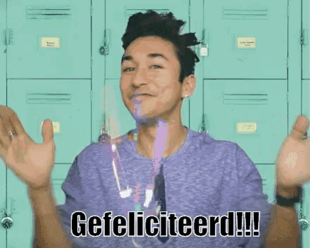 a man in a purple shirt is surrounded by confetti and says gefeliciteerd !!