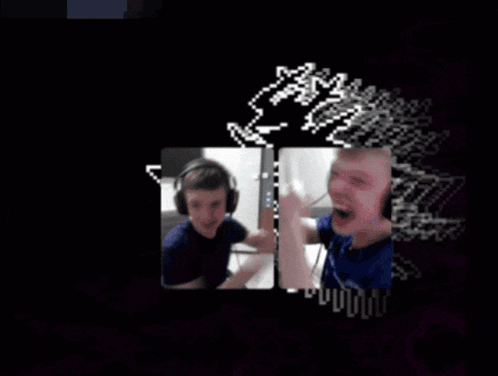 a man wearing headphones talks to another man in a dark room
