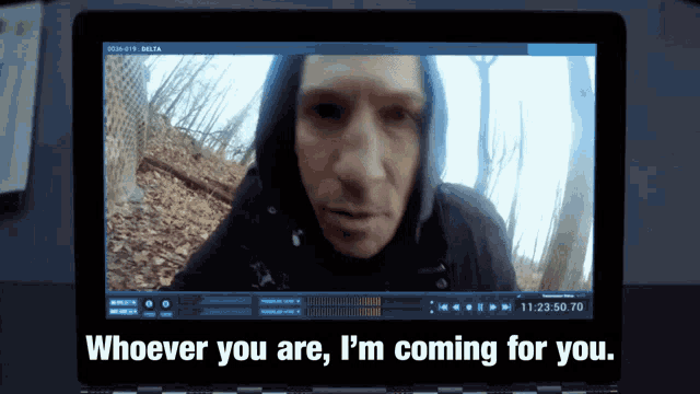 a computer screen shows a man in a hood and the words " whoever you are i 'm coming for you "