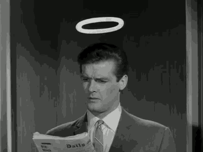 a man in a suit and tie is reading a newspaper with a halo above his head
