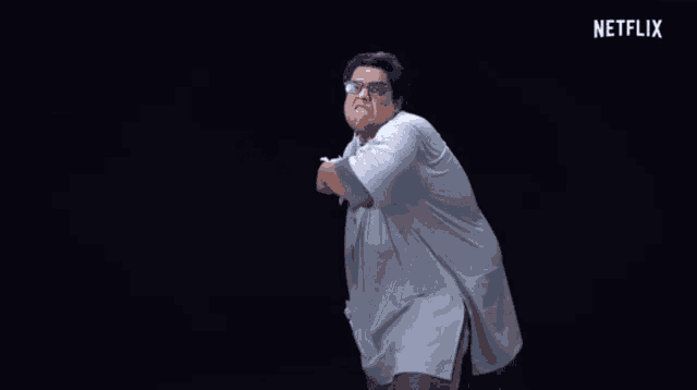 a man throwing papers in the air with a netflix logo in the corner