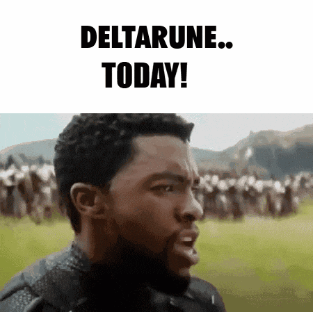 a man with a beard is standing in front of a crowd of people and says `` deltarune today '' .