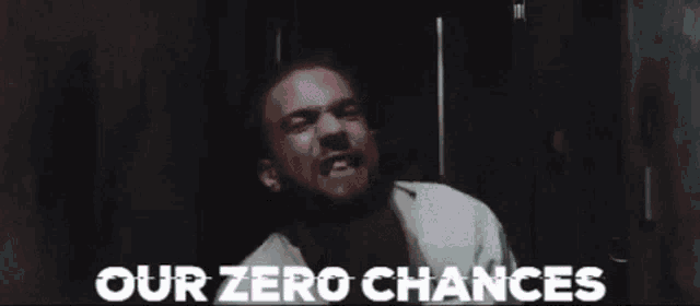 a man is wrapped in a blanket and the words our zero chances are displayed