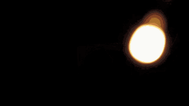 a close up of a ring with a flame coming out of it