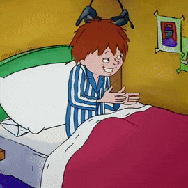 a cartoon of a boy laying in bed with a picture of a man on the wall behind him