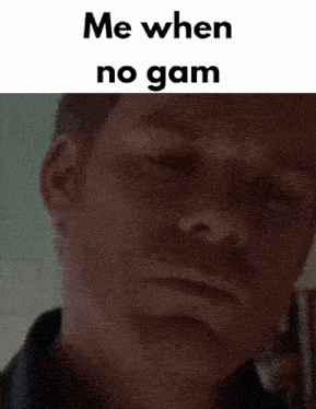 a close up of a man 's face with the words me when no gam written above it