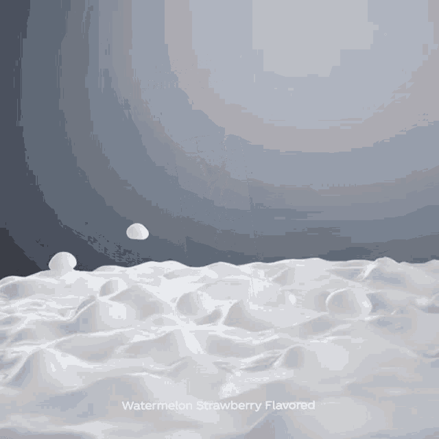a watermelon strawberry flavored foamy surface with bubbles floating in it