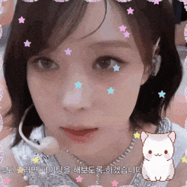 a close up of a woman 's face with a cat and stars on it