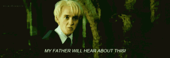 a man in a suit and tie is standing in the woods and says `` my father will hear about this '' .