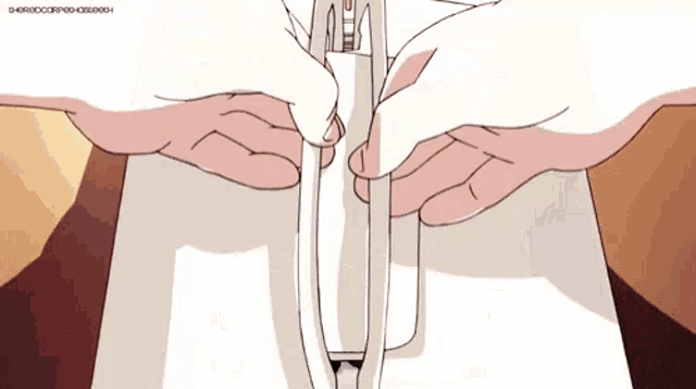 a person is using a stapler to staple a piece of paper in their hand