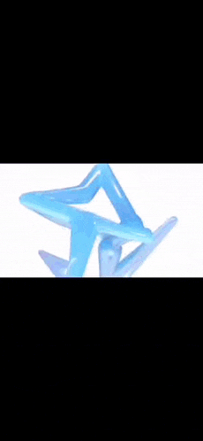 a close up of a pink and purple star on a blue background .