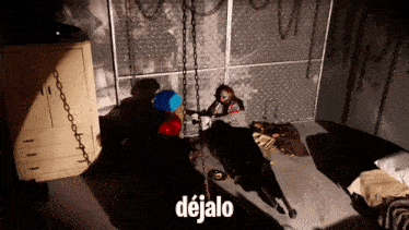 a room with chains and a sign that says dejalo on it
