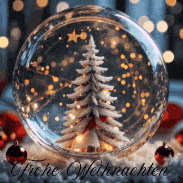 a snow globe with a christmas tree in it and the words frohe weihnachten