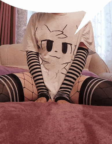 a person wearing a striped shirt and fishnet stockings