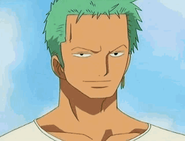 a close up of a man 's face with green hair and a white shirt .