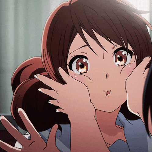 a close up of a girl making a funny face