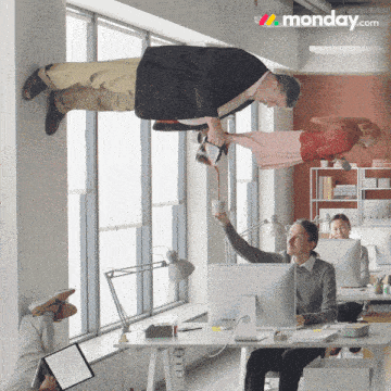 a monday.com ad shows a man pouring a cup of coffee into a woman 's hand