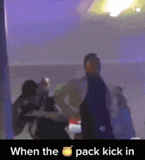 a group of people are dancing in a room with the words when the pack kick in at the bottom