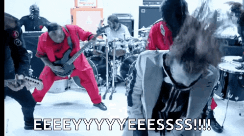 a group of men playing instruments with the words eeeeyyyyeeesss on the bottom right