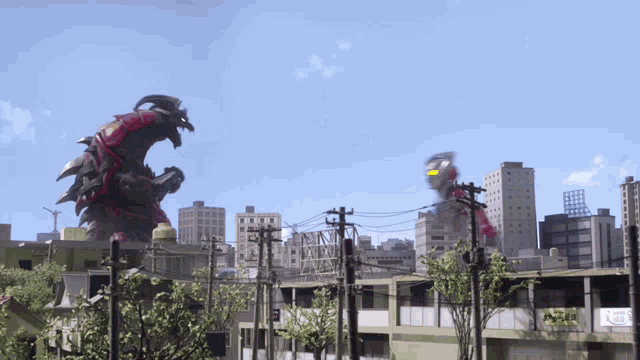 a monster is flying over a city with a sign that says ' a ' on it
