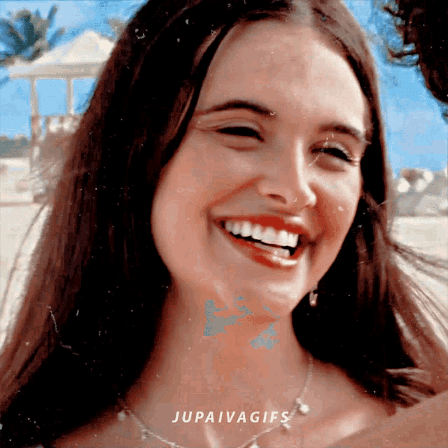 a woman is smiling with the caption jupaivagifs