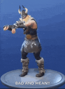 a video game character is standing on a pedestal with the words bad and mean written on it .